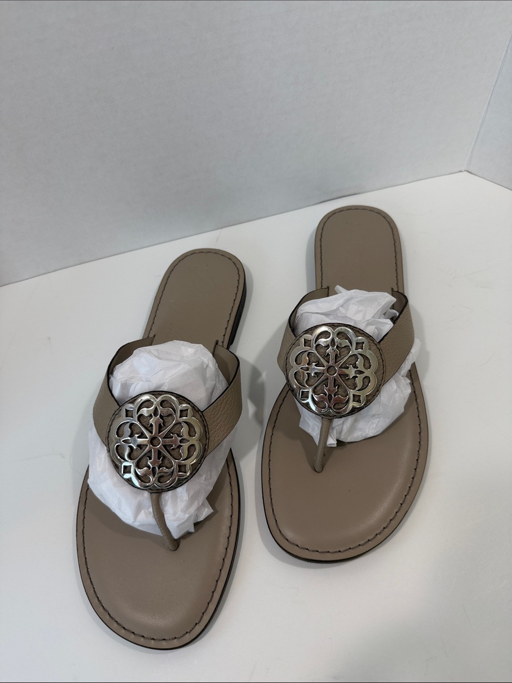 Brighton Taupe Thong Sandals with Decorative Silver Medallion